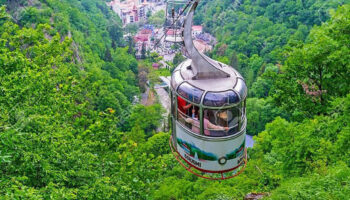 Borjomi — a famous spa town known for its mineral water springs, lush nature, and therapeutic climate.