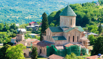 Gelati Monastery, founded in 1106 by King David IV, is a key monument of Georgia’s Golden Age, known for its frescoes, mosaics, and royal tombs.